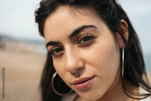 Portrait of a girl with septum piercing photo