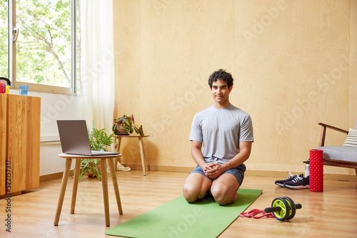 Hispanic sportsman ready for online training at home