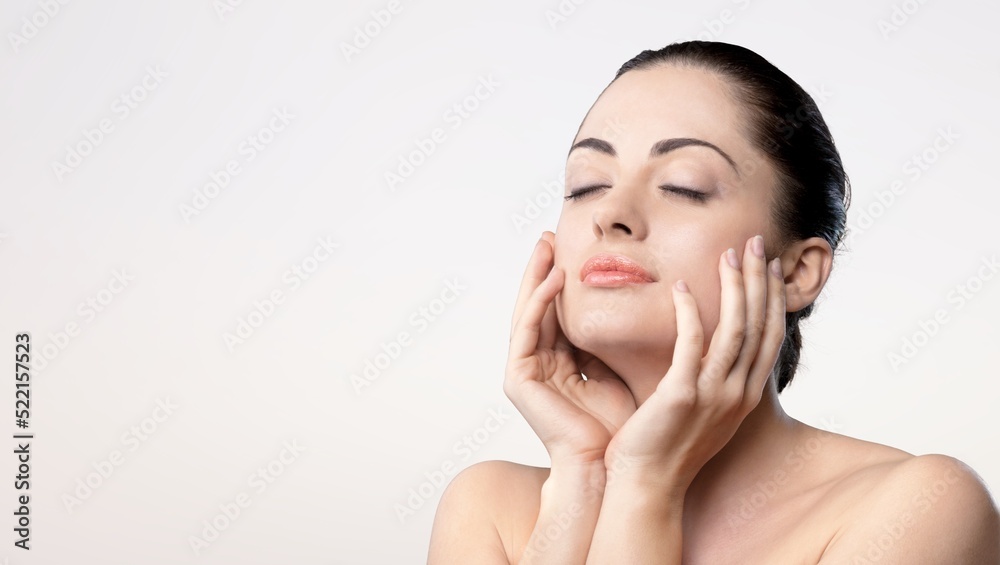 Beautiful young woman with clean fresh skin, Face care, Facial treatment, Cosmetology, beauty and spa Beautiful young woman with clean fresh skin, Face care, Facial treatment, Cosmetology, beauty and spa
