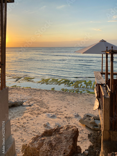 View of empty beach at sunset time. Bali, Indonesia photo