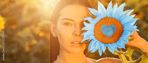 Beautiful young woman with ...