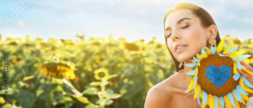 Beautiful young woman with ...