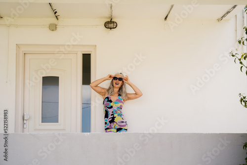 Portrait of glam woman at home photo