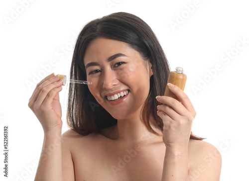Young Asian woman with cosm...