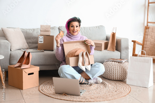 Beautiful woman with credit...