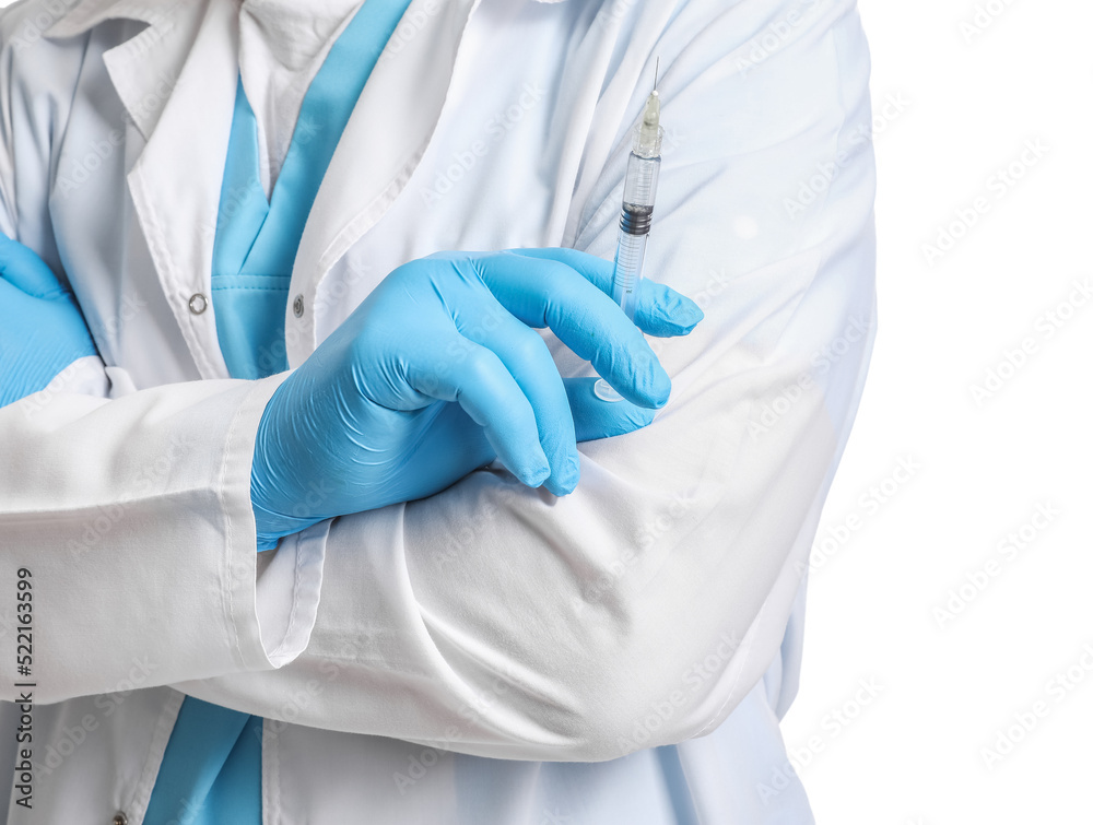 Doctor with syringe on white background, closeup Doctor with syringe on white background, closeup