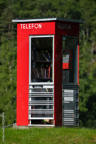 Red telephone booth in Norway.