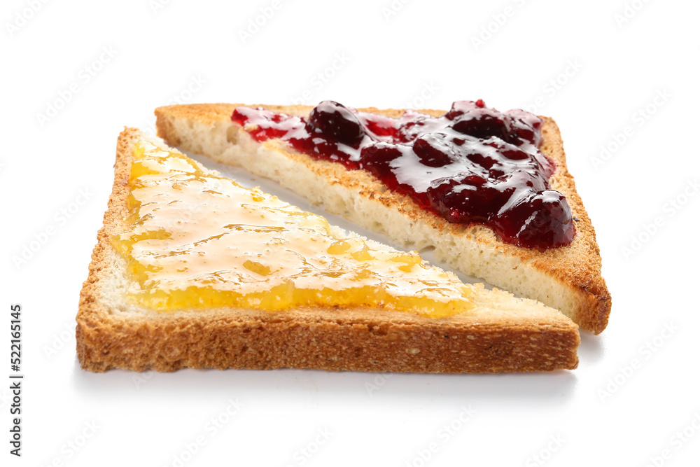 Pieces of toasted bread with jam isolated on white background Pieces of toasted bread with jam isolated on white background