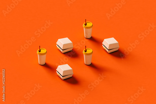 fast food hamburger boxes and drinks on red background