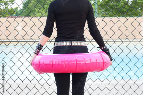 Goth Emo Girl Looking at Pool photo