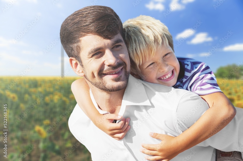 Concept of friendly family spend time together in nature. Walk in the summer outdoors. Concept of friendly family spend time together in nature. Walk in the summer outdoors.