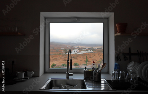 view on landscape Fuerteventura, seen through kitchen window photo