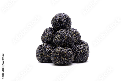 Black sesame balls isolated on white background. Black sesame ball, Chinese super food reduce oxidation in the body, improve blood pressure, and provide antioxidants that help fight cancer