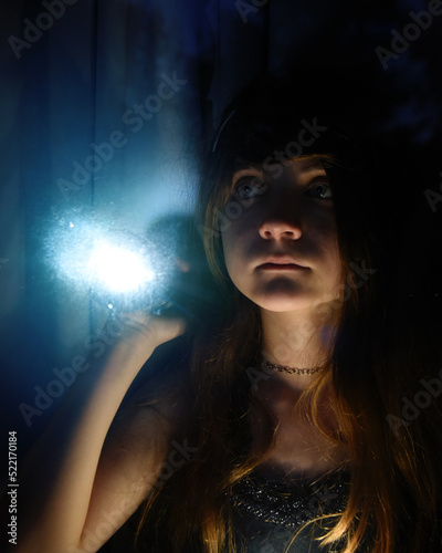 Power Outage Girl with Flashlight photo