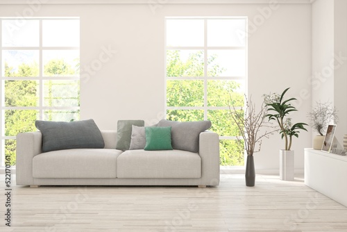 Minimalist living room in white color with sofa and summer landscape in window. Scandinavian interior design. 3D illustration