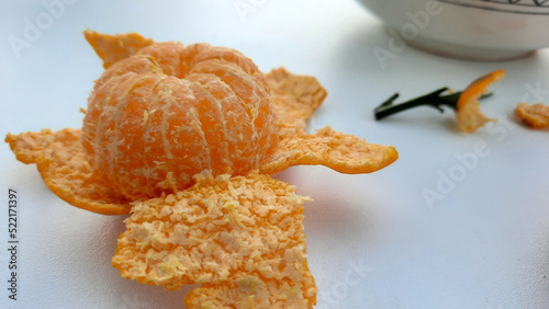 Peeled mandarin oranges isolated on white background 02
