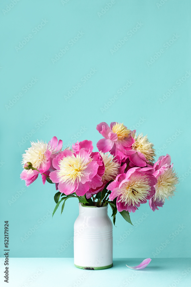 Vase filled with peony roses Vase filled with peony roses
