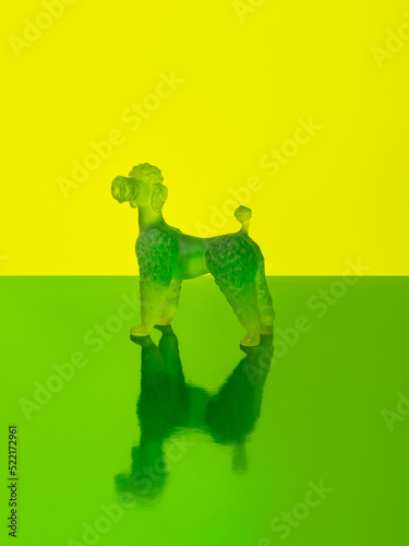 Kitsch till life with a glass dog figurine photo
