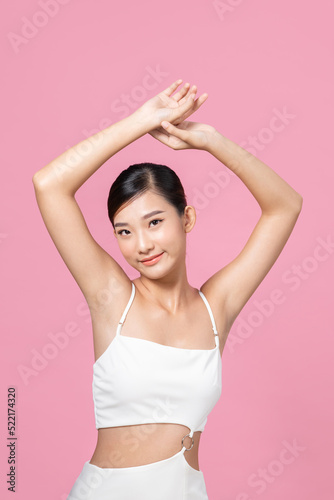Portrait of beautiful healthy slim asian show armpit waxing photo