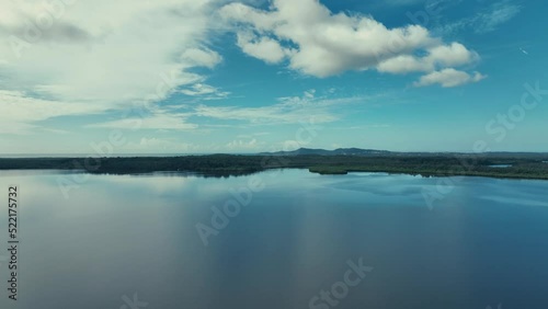 Flight across Lake Cootharaba towards Noosa Heads and National Park - Fall photo