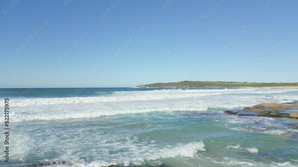 Aerial drone flying low heading to the ocean at Maroubra Beach, Sydney - Australia Aerial drone flying low heading to the ocean at Maroubra Beach, Sydney - Australia