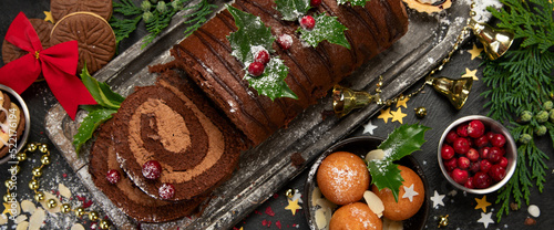Canvastavla Chocolate yule log on dark background.