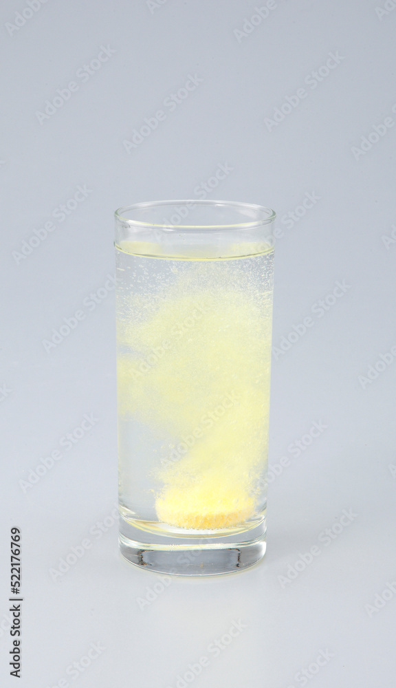 Vitamin C with B complex , Calcium , Magnesium Tablet dissolved in a glass of water. Vitamin C with B complex , Calcium , Magnesium Tablet dissolved in a glass of water.