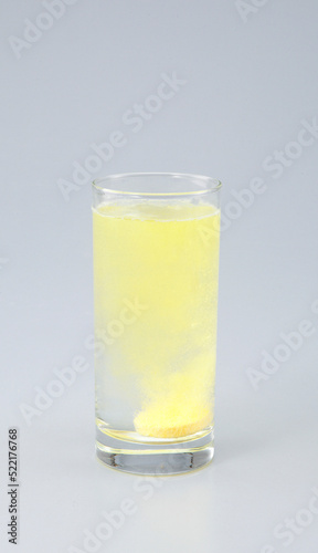Vitamin C with B complex , Calcium , Magnesium Tablet dissolved in a glass of water.