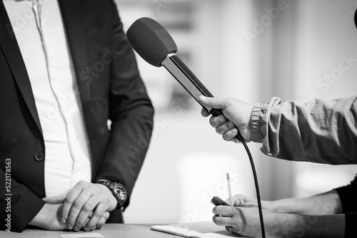 News reporters interviewing a public relations spokesperson. © Microgen