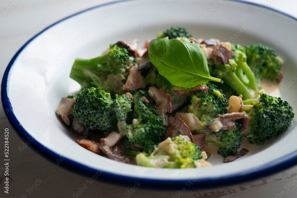 Broccoli carbonara with cream, onion and bacon. Broccoli carbonara with cream, onion and bacon.