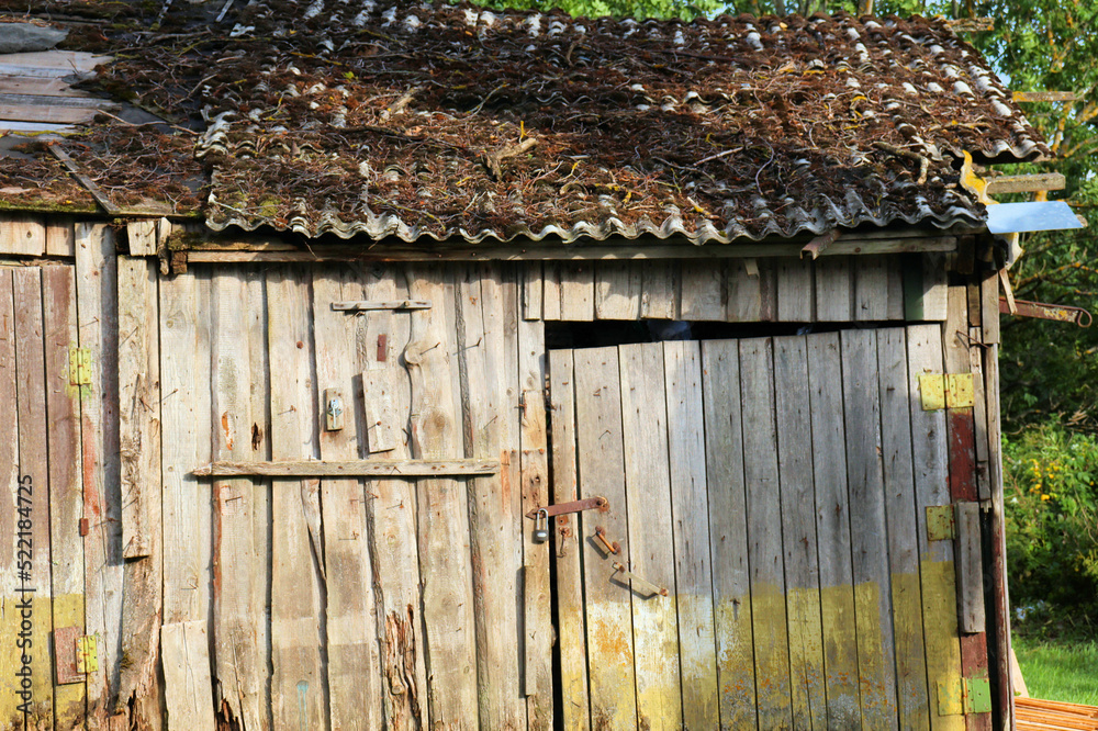 Naklejka premium Old wooden barn in the village