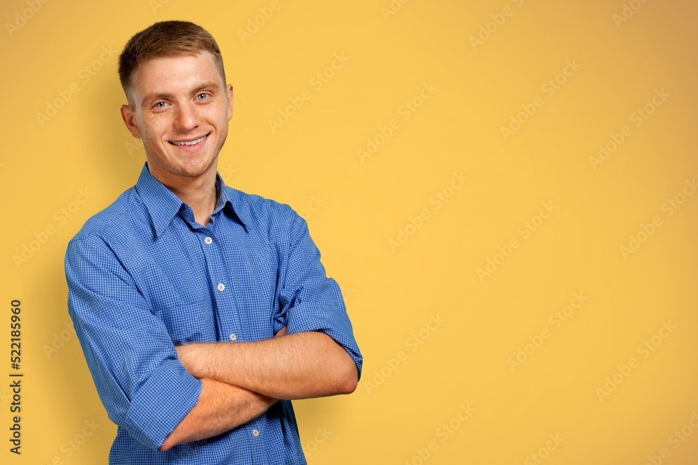 Young smiling cheerful satisfied positive happy man. People lifestyle concept Young smiling cheerful satisfied positive happy man. People lifestyle concept
