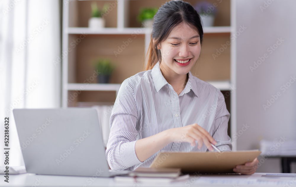 Business Documents, Auditor business Asian woman checking searching document legal prepare paperwork or report for analysis TAX accountant Documents data contract partner deal in the workplace office Business Documents, Auditor business Asian woman checking searching document legal prepare paperwork or report for analysis TAX accountant Documents data contract partner deal in the workplace office