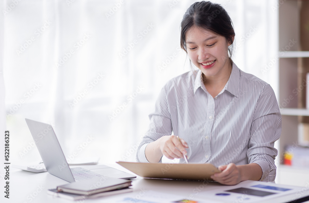 Business Documents, Auditor business Asian woman checking searching document legal prepare paperwork or report for analysis TAX accountant Documents data contract partner deal in the workplace office Business Documents, Auditor business Asian woman checking searching document legal prepare paperwork or report for analysis TAX accountant Documents data contract partner deal in the workplace office
