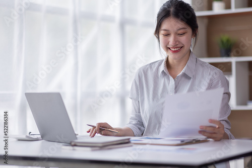 Business Documents, Auditor business Asian woman checking searching document legal prepare paperwork or report for analysis TAX accountant Documents data contract partner deal in the workplace office