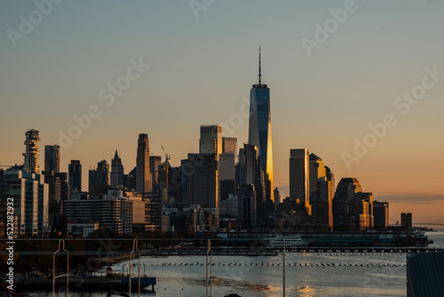 Amazing sunrise over manhattan - Birds Eye. Aerial view. Manhattan after sunset. Beautiful cityscape. New York City in the glow of sunset.Aerial Panorama of New York Skyline at Night