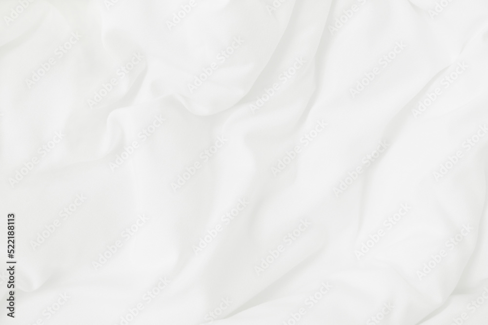 Obraz premium Texture of white blanket and bedding sheet with crumpled or messy in bedroom after wake up.