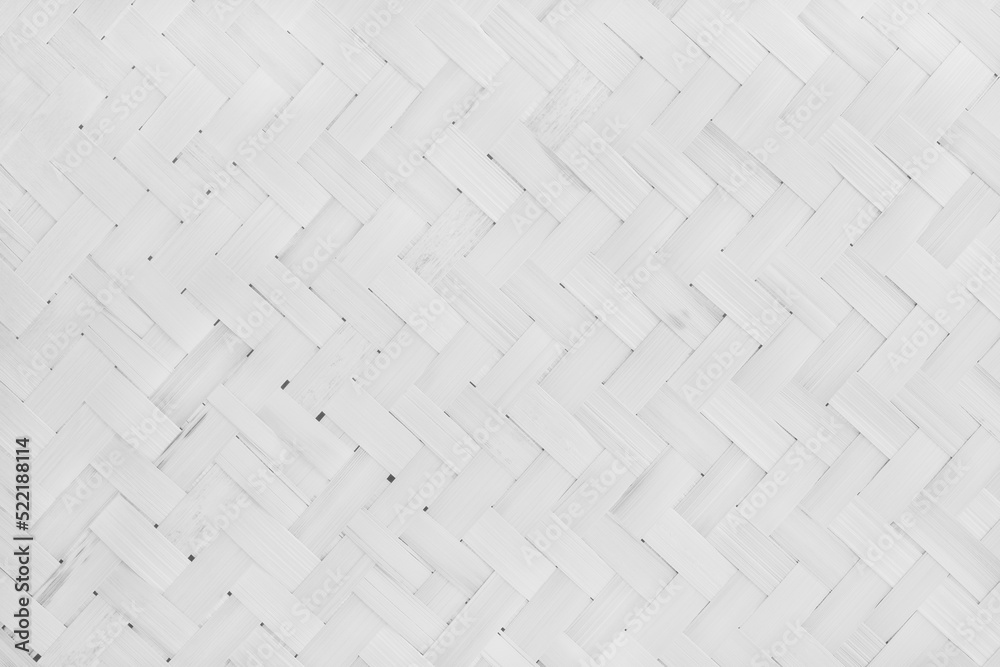 Fototapeta premium Old white bamboo weave texture background, pattern of woven rattan mat in vintage style.