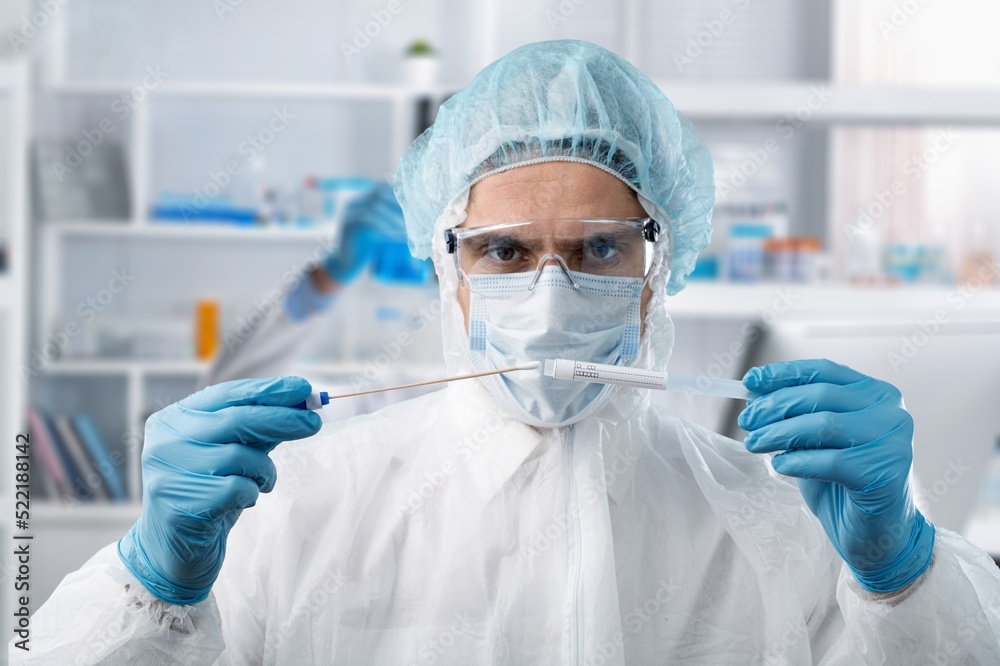 Lab technician researching for analysis in the laboratory. Microbiologist working and examining mold and fungal culture Lab technician researching for analysis in the laboratory. Microbiologist working and examining mold and fungal culture