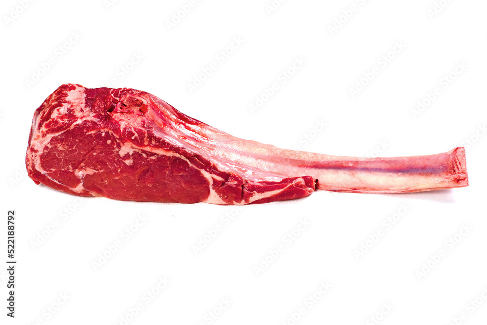 Fresh uncooked tomahawk steak on the bone on white background. Prime cut of beef. High quality product with marbling and delicate flavor for special occasion.. Butcher craft. Fresh uncooked tomahawk steak on the bone on white background. Prime cut of beef. High quality product with marbling and delicate flavor for special occasion.. Butcher craft.