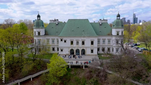 Aerial drone view of Ujazdow Castle, located in Agrykola Park in Warsaw, Poland, 4k photo