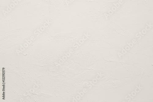 Light pastel gray beige colored low contrast Concrete textured background. Empty colourful wall texture with copy space for text overlay and mockups. 2023, 2024 color trend