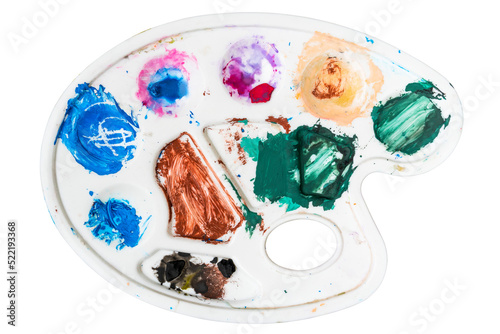 Art palette with stains of watercolor paint