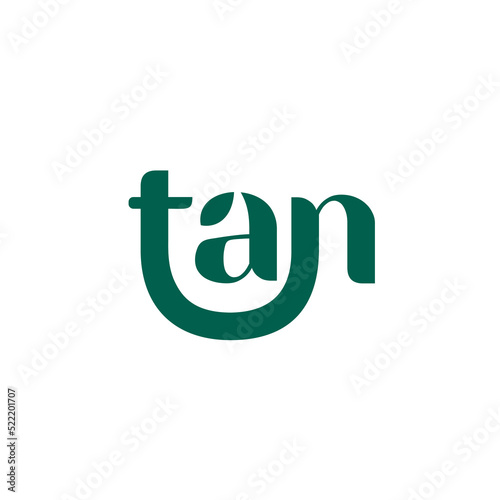 letter tan typography logo design. nature logo with Leaf icon in letter a and t creative monogram symbol. Playful logo and simpel typography logo