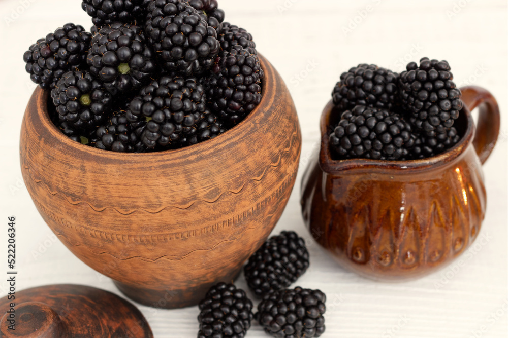 pots with blackberries pots with blackberries