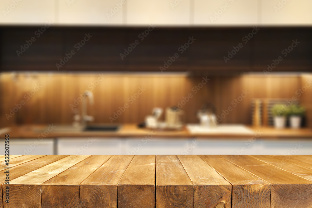Desk of free space and kitchen interior. 