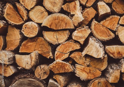 Background from split logs. Woodpile. Horizontal image. Back for design  space for text. Copy space.