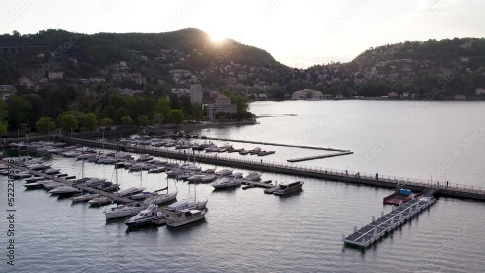 Sunset aerial of marina at Como filled with leisure craft, Lake Como, Italy Sunset aerial of marina at Como filled with leisure craft, Lake Como, Italy