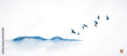 Blue landscape with birds flying over the hill. Traditional oriental ink painting sumi-e, u-sin, go-hua. Translation of hieroglyph - eternity.