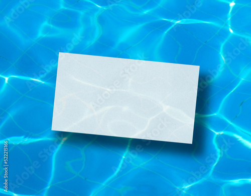 blank business card mockup under water 